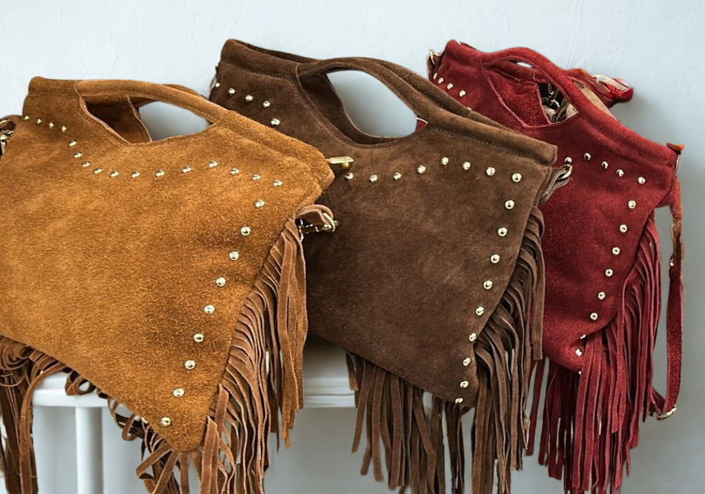 Borsa con borchie e frange