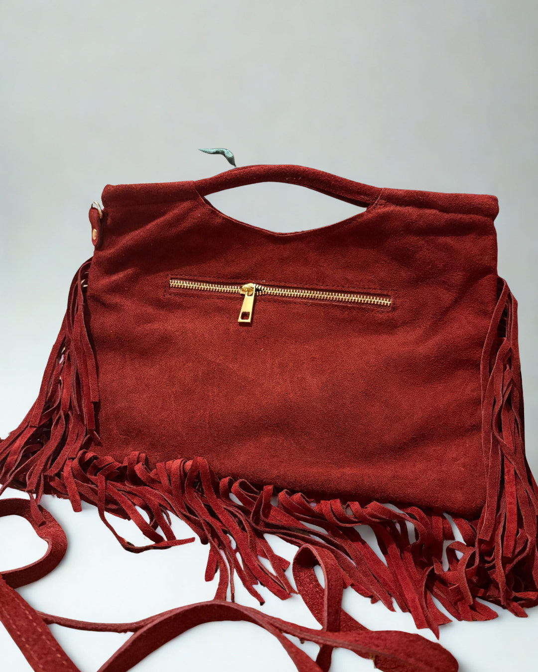 Borsa con borchie e frange